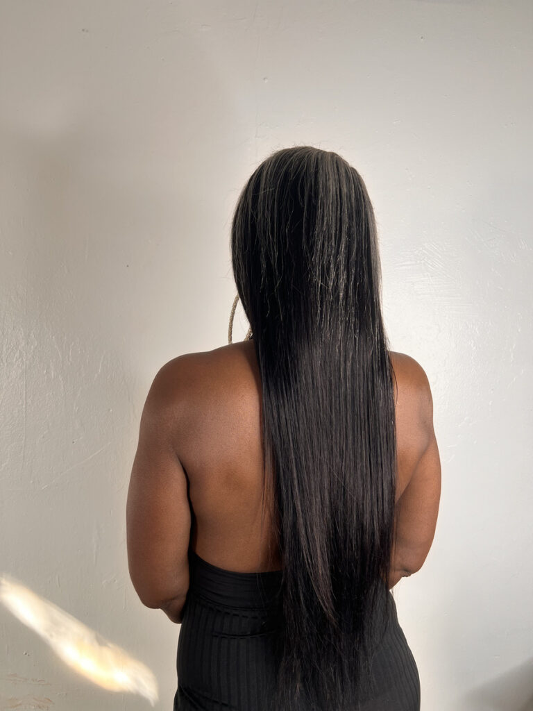 Woman with long hair viewed from behind