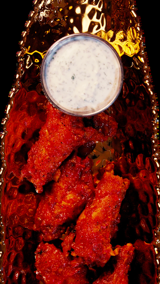 Harissa honey chicken wings with herb yogurt dip